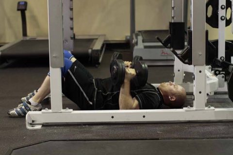 Finishing position of the Dumbbell Floor Press